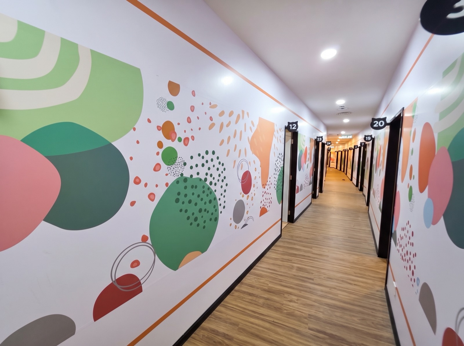 Corridor wall graphics — co-living space
