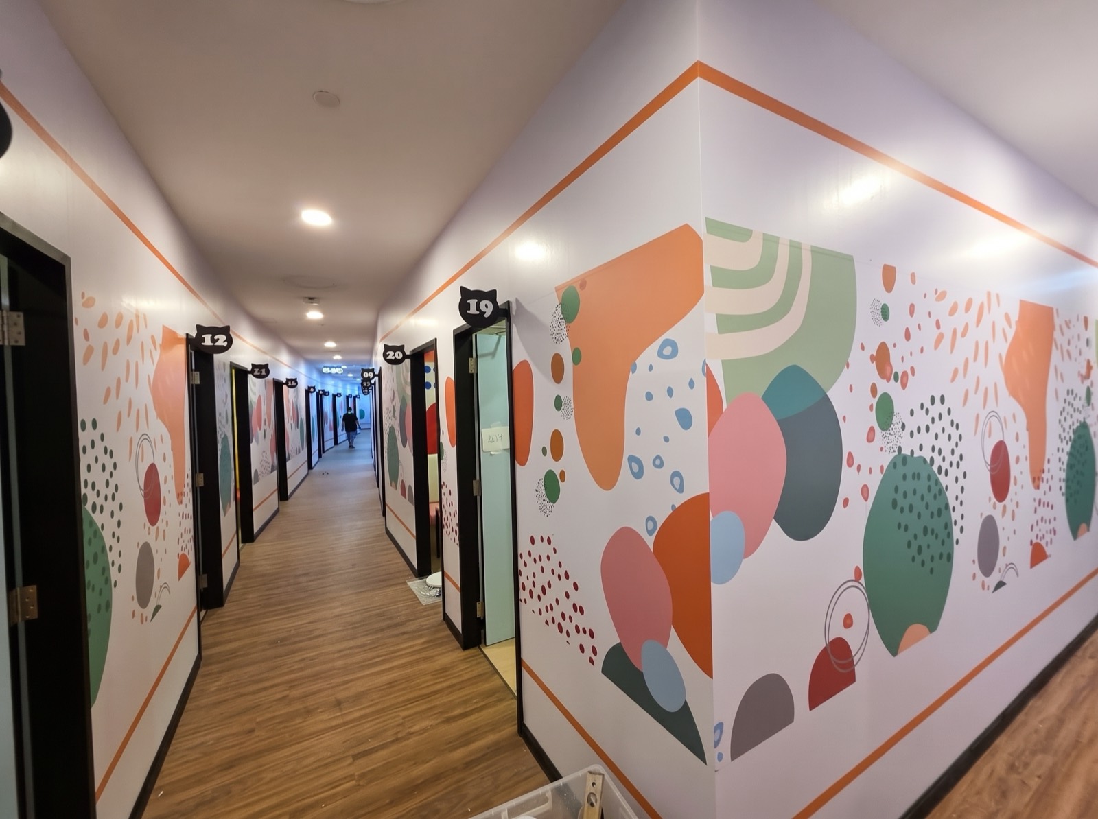 Wall & door graphics — co-living space